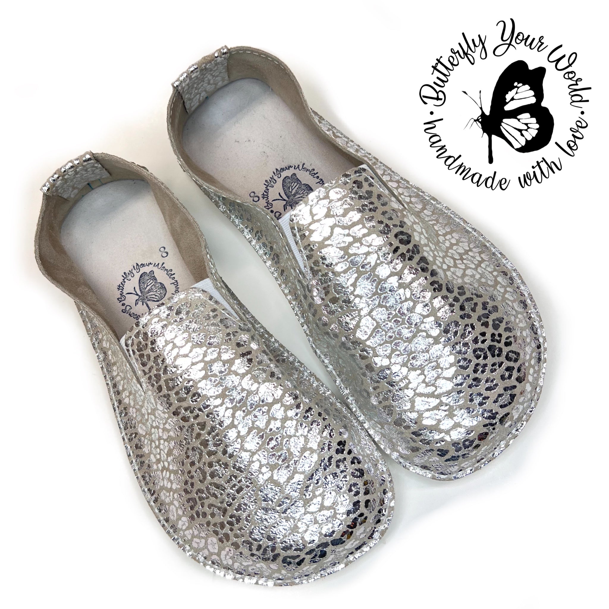 Women’s shimmery silver leather loafers